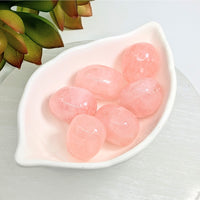 Thumbnail for Pink translucent spherical candies in a white dish, enhancing Rose Quartz Drilled 24mm charm