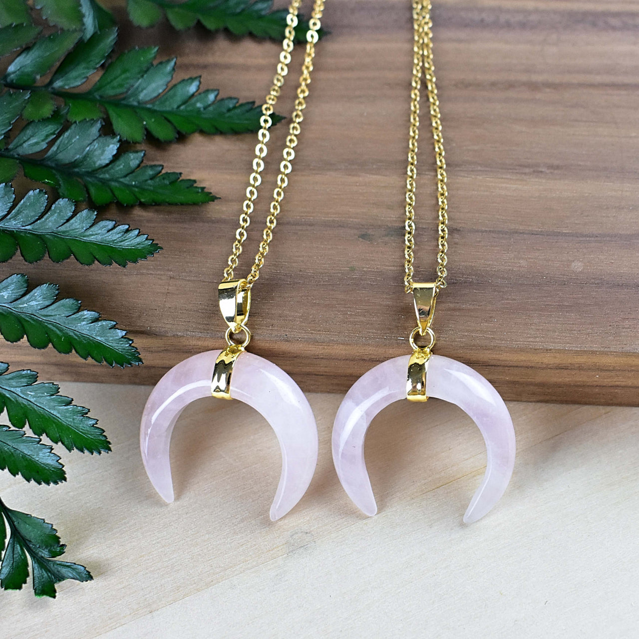 Two rose quartz moon pendants on 18-inch gold necklaces LV9191