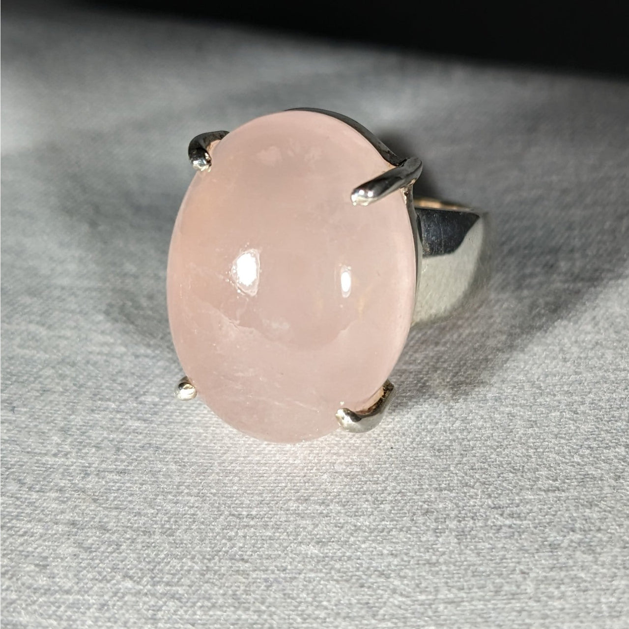 Oval-cut rose quartz gemstone set in a silver ring design for Rose Quartz S.S. Ring #J882