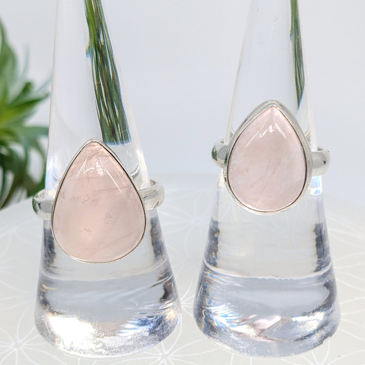 Two silver teardrop rings with rose quartz stones, showcasing Rose Quartz S.S. Teardrop Ring