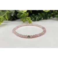 Pink beaded Rose Quartz stretchable bracelet with silver accents, 7.5 inches long