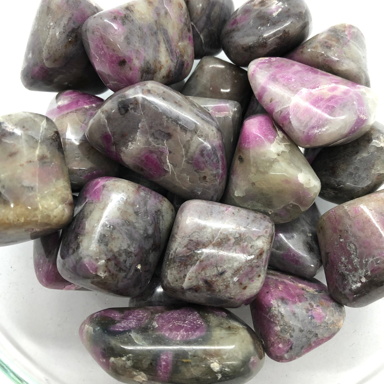 Tumbled Ruby Feldspar Tumbled stones in pink and gray, ideal for collectors