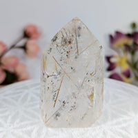 Clear quartz point with black and gold inclusions in Rutilated Quartz 2 Generator Tower