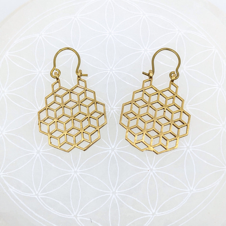 Gold finish earrings featuring a sacred geometry honeycomb pattern with hook attachments