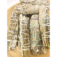 Thumbnail for Bundled sage smudge sticks wrapped with white string in Sage & Herb Cleansing Bundle