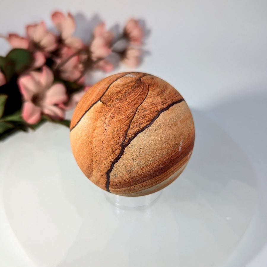 Polished 2.1-inch Sandstone Sphere #BC0206 with amber tan swirls