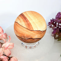 Polished Sandstone 2.1-inch wooden sphere #BC0702 with amber grain