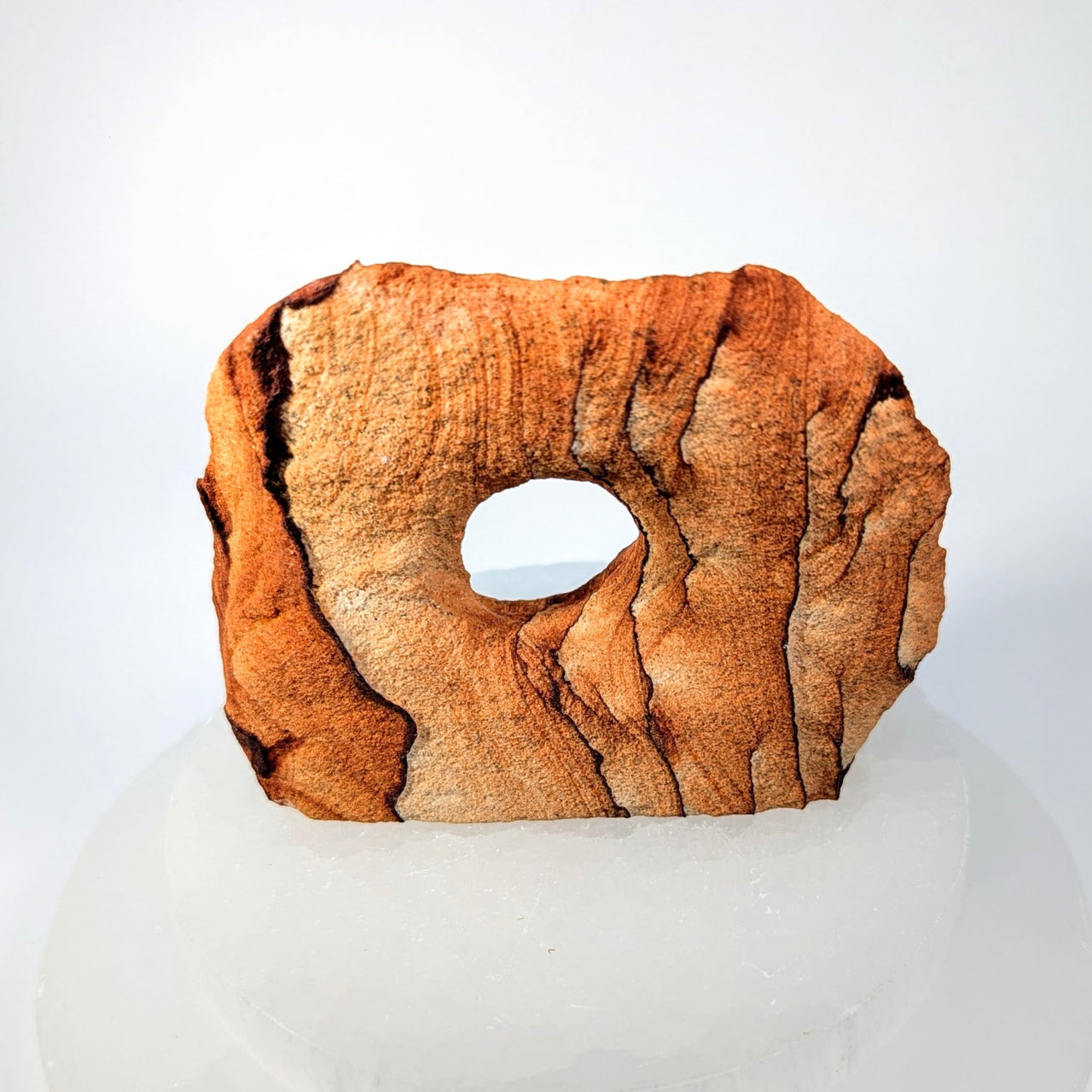 Rustic orange-brown 3.5’’ sandstone arch specimen #BC0218 with central hole