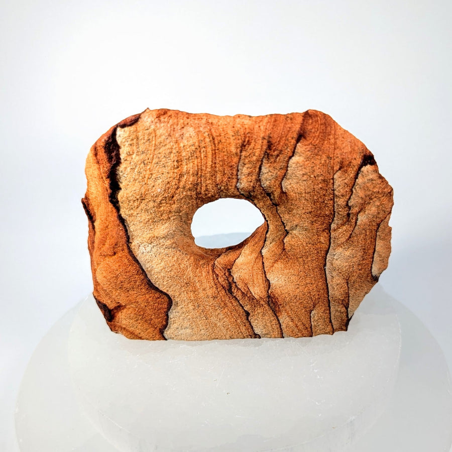 Rustic orange-brown 3.5’’ sandstone arch specimen #BC0218 with central hole