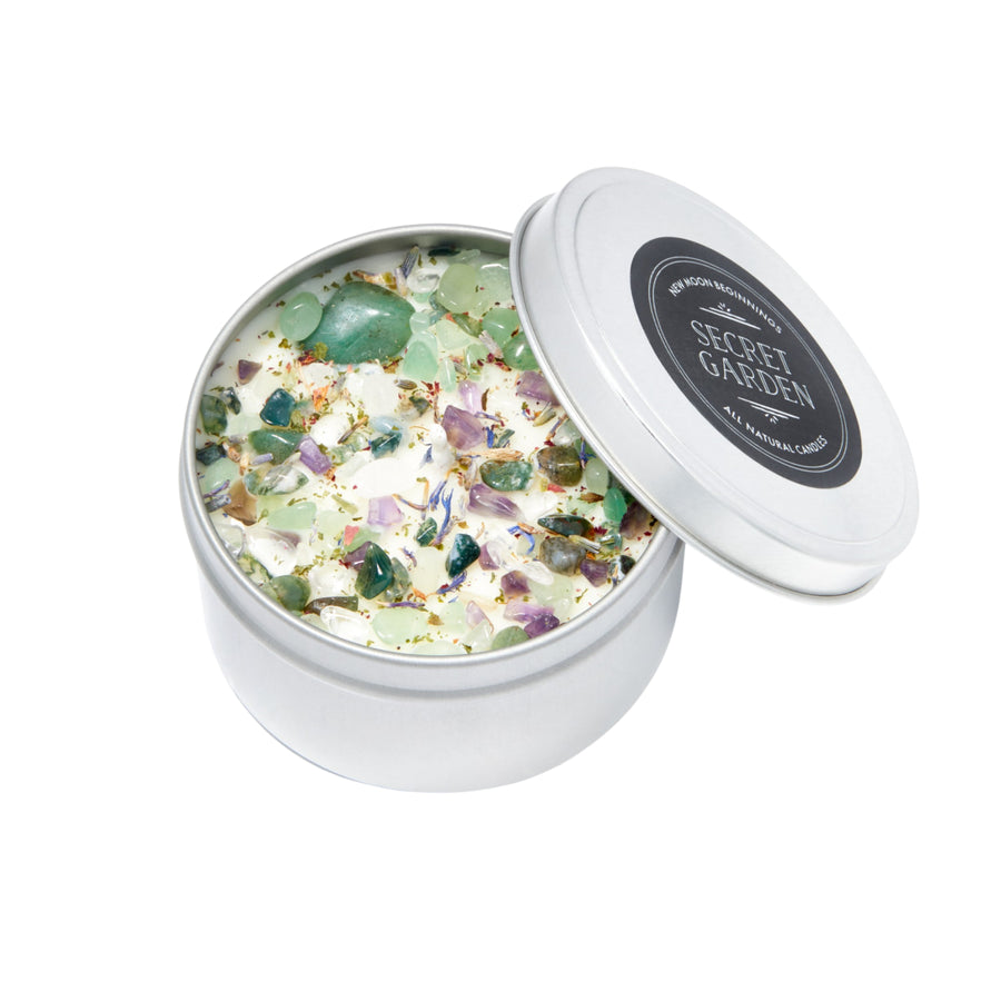 Open tin candle with embedded crystals in a glass jar for Secret Garden Ritual Candle