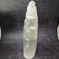 Thumbnail for Close-up of a Selenite 15’ Tower Lamp (#SK9984) crystal on a black background