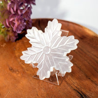 Translucent white selenite snowflake carving, 2.75 inch, on acrylic stand