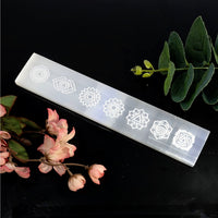 White Selenite flat bar with engraved chakra symbols for healing and energy balancing