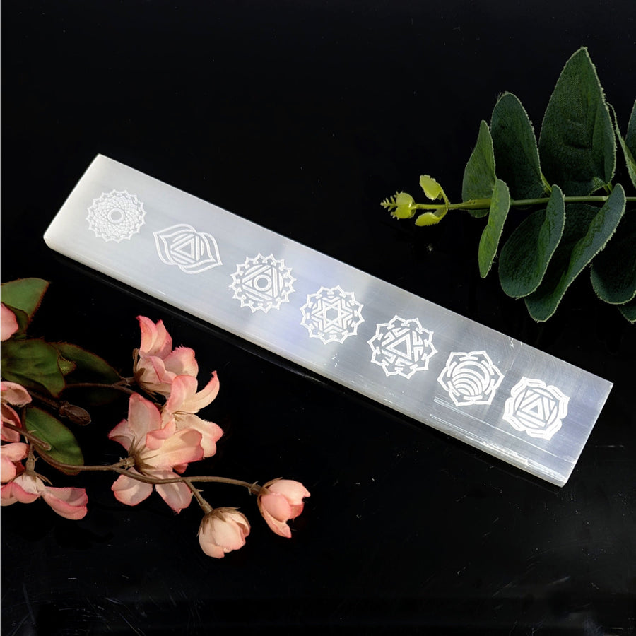 White Selenite flat bar with engraved chakra symbols for healing and energy balancing