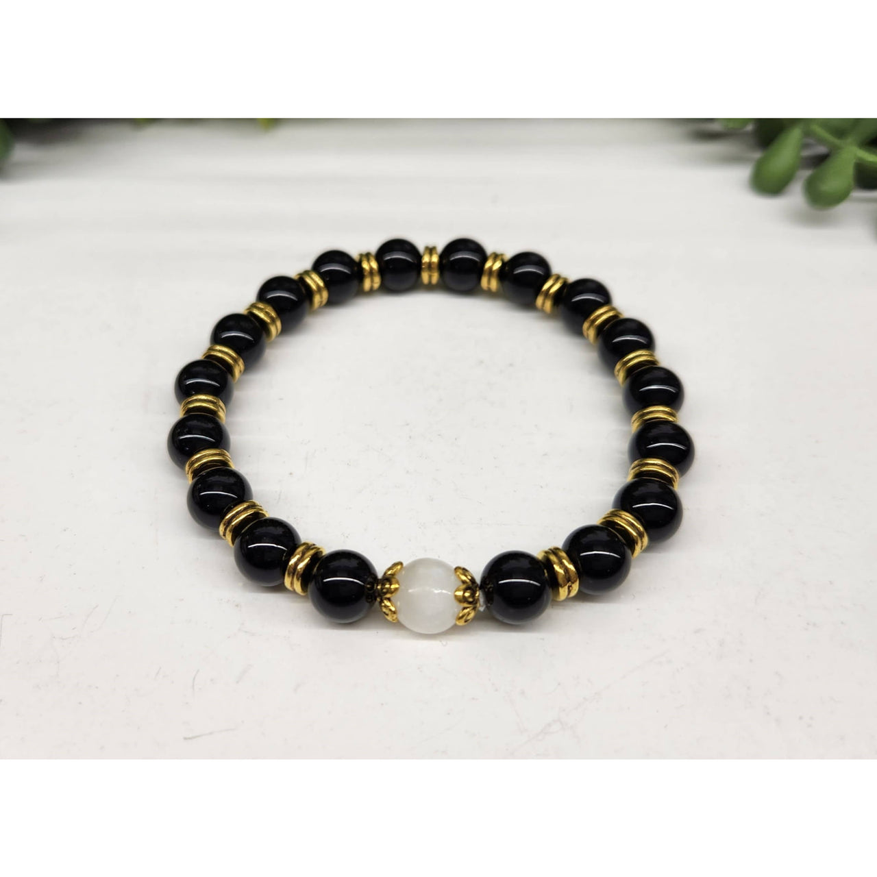 Selenite glossy black obsidian bracelet with gold beads, 8mm, 7.5 inches