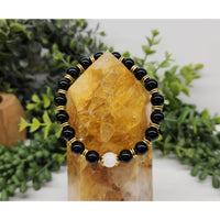Black onyx beaded bracelet with gold accents and moonstone on citrine
