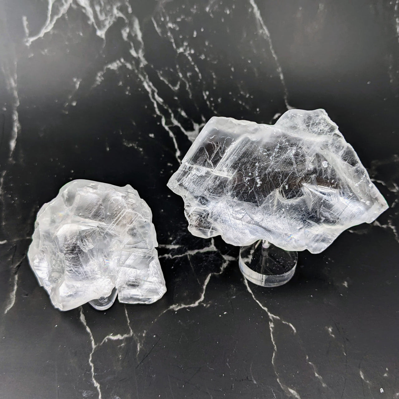 Two ice cubes on Selenite Ice Slab Specimen from Utah, perfect for feng shui décor