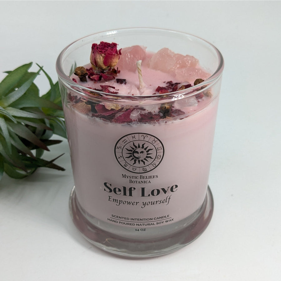 Pink candle with rose petals and crystals from Self Love Scented Intention Candle with Rose Quartz and Flowers