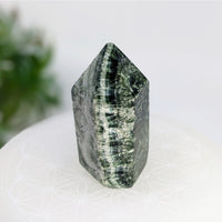 Polished green and white striped crystal point from Seraphinite 2 Inch Generator LV7610