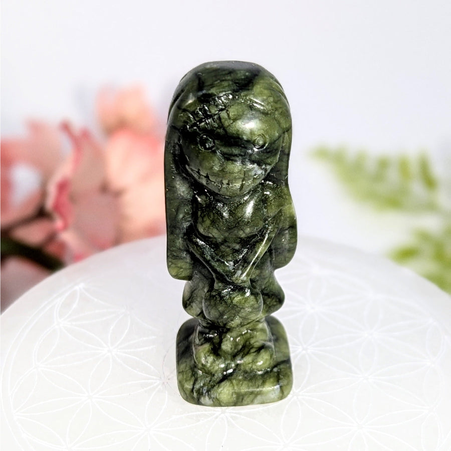 Polished green jade Serpentine 2.25’’ Sally skeletal figurine #BC0781