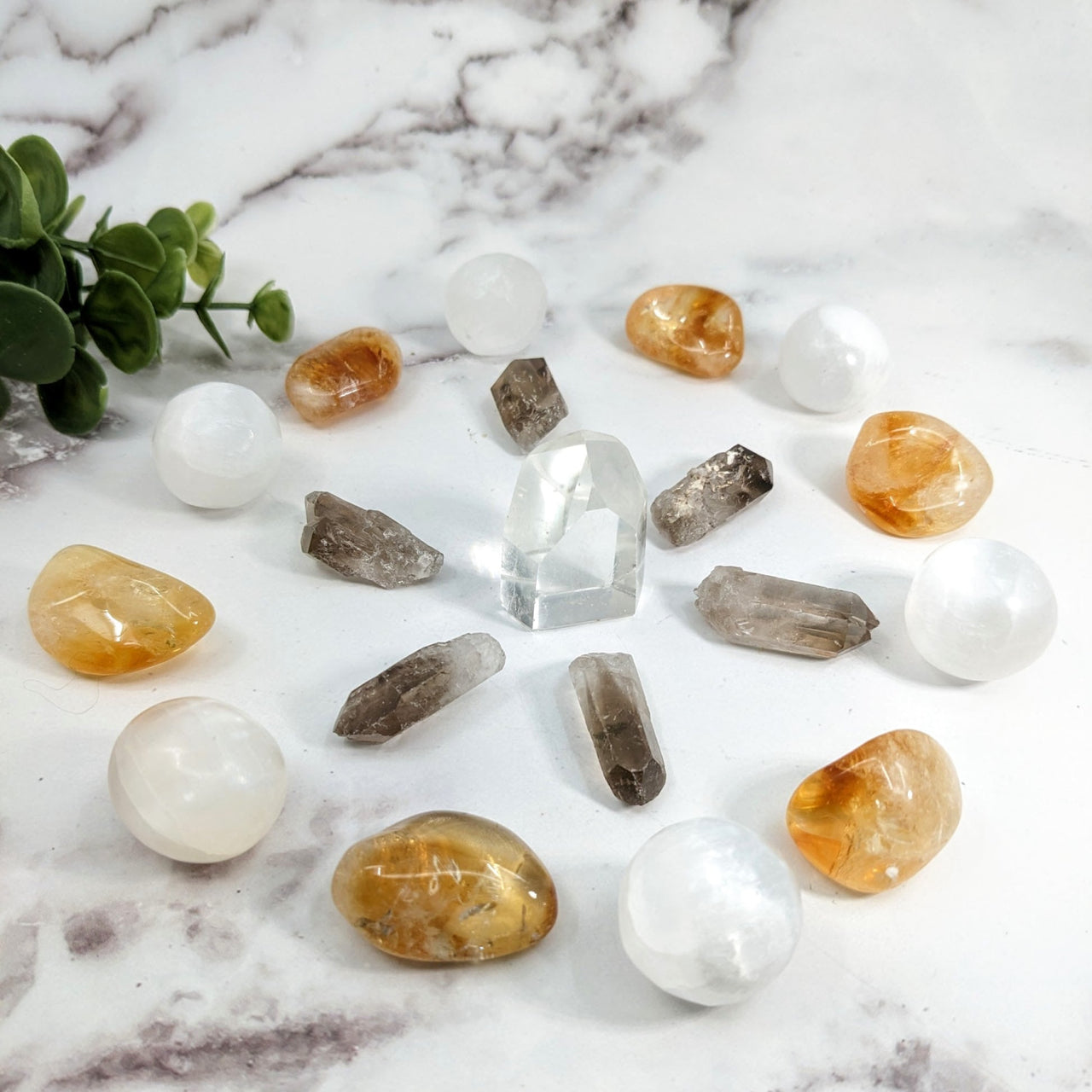 Set of Stones for Sacred Crystal Grid including quartz on a marble counter #LV3094