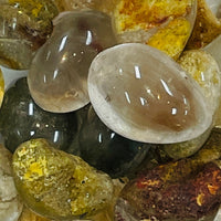 Thumbnail for Polished Shaman Garden Quartz spheres and rough mineral specimens in yellow and red tones