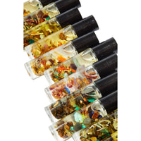 Thumbnail for Small bottles filled with colored leaves, Sleep Well Intention Roll-on, essential oils