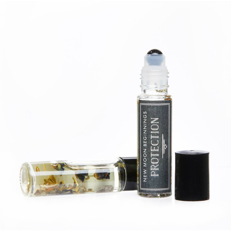 Sleep Well essential oils perfume bottle with black cap on white background, jojoba oil base