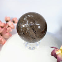 Polished 2-inch smoky quartz sphere BC0366 with reflective surface