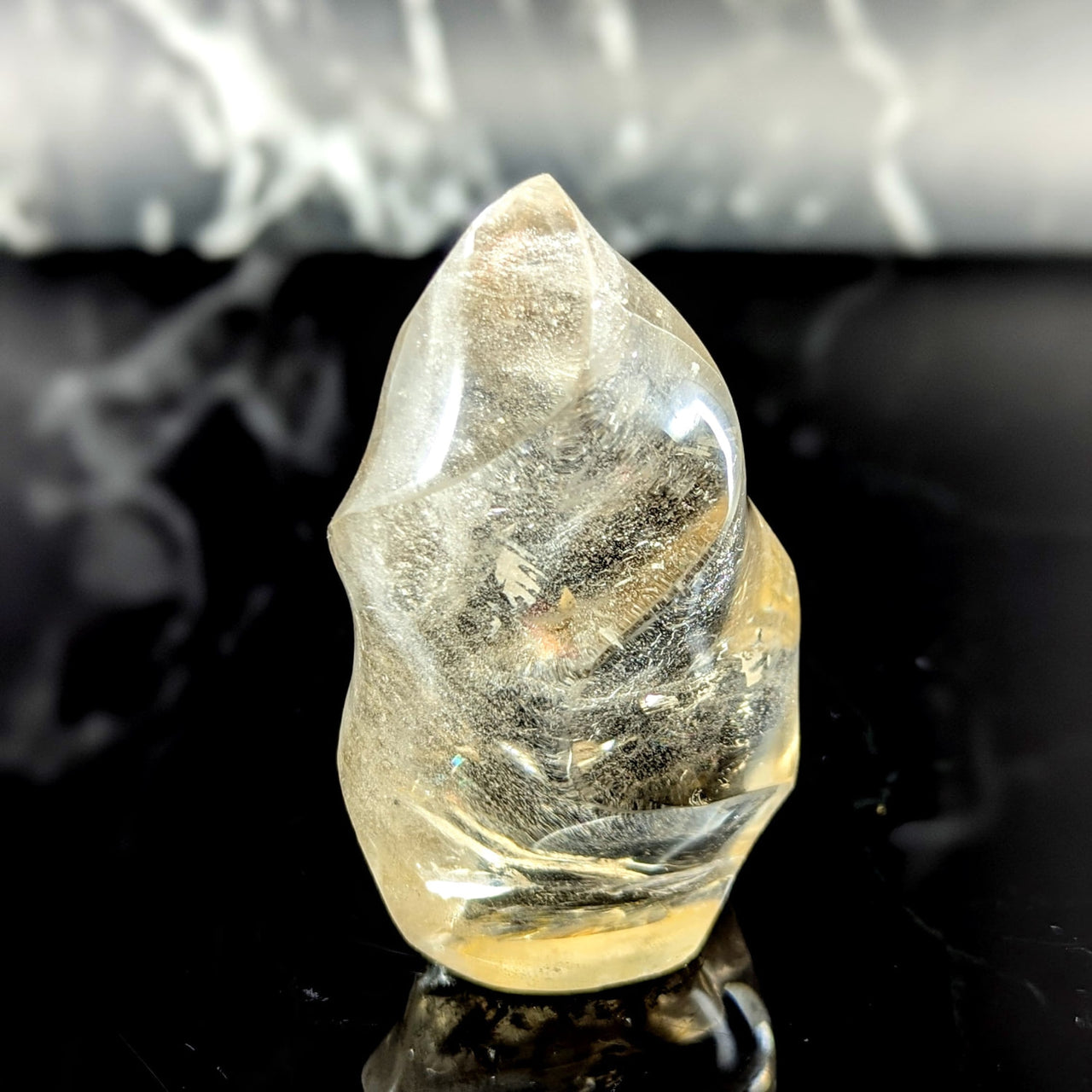 Smoky quartz 3.5 inch flame translucent pale yellow crystal with smooth polished surface and internal inclusions