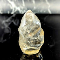 Smoky quartz 3.5 inch flame translucent pale yellow crystal with smooth polished surface and internal inclusions