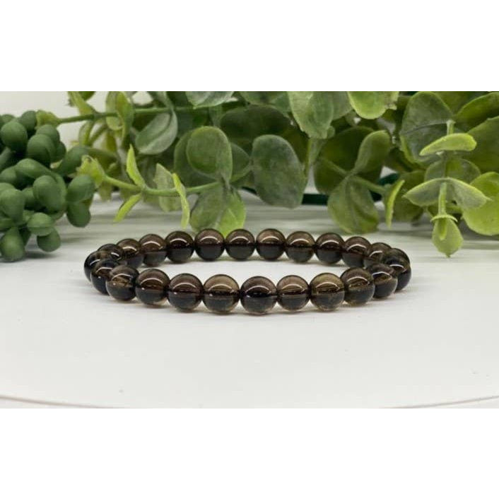 Brown beaded stretchable bracelet with 8mm Smoky Quartz beads, 7.5 inches long