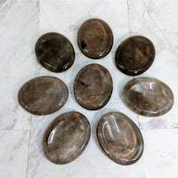 Thumbnail for Six glass bowls with a white marble background featuring Smoky Quartz Thumb Stone #LV2265