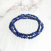 Thumbnail for Close-up of Sodalite Faceted 7’ 4mm Bead Bracelet #LV2149 with blue beads on a marble surface