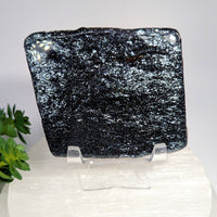 Specular Hematite 3-inch polished stone slice with black glittery glass art surface