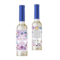 A clear glass bottle of spiritual cleansing water with a blue cap and an ornate purple white and gold label