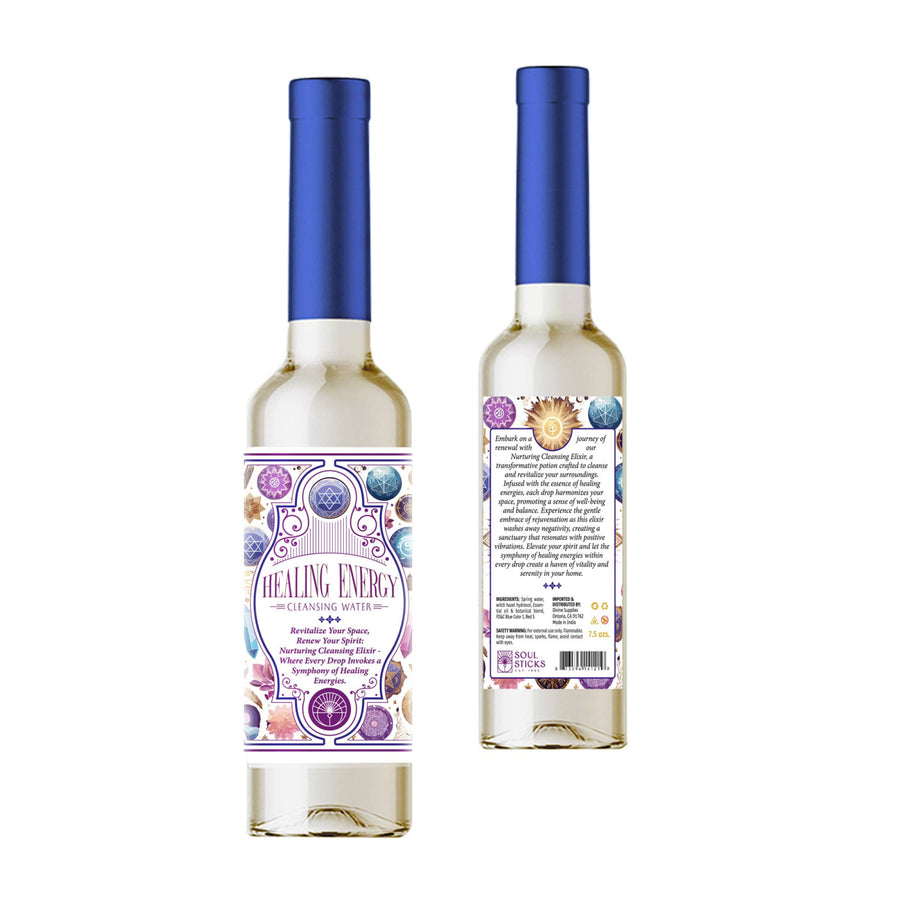 A clear glass bottle of spiritual cleansing water with a blue cap and an ornate purple white and gold label