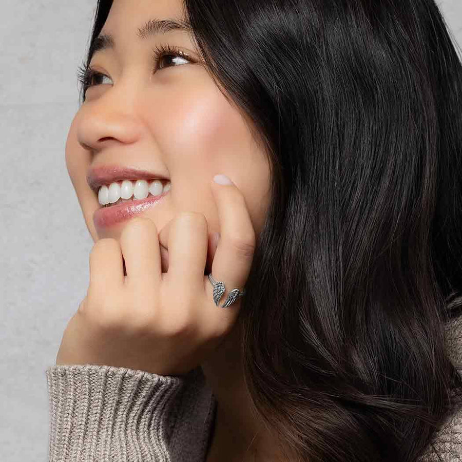 Sterling Silver Adjustable Angel Wing Ring LV9569 with Silver Skull Design