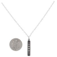 Sterling silver vertical moon phase necklace with black accents LV9574