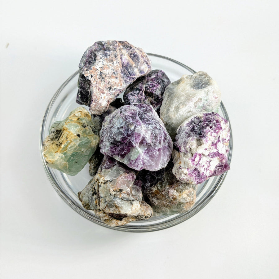 Raw Striped Fluorite Rough crystals in a glass bowl for mineral collectors