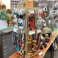 Colorful Tagua Jewelry Necklaces and Earrings display with vibrant craftsmanship