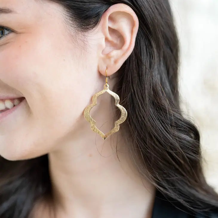 Elegant woman showcasing Talia Gold Earrings #LV3824 for a stylish and sophisticated look