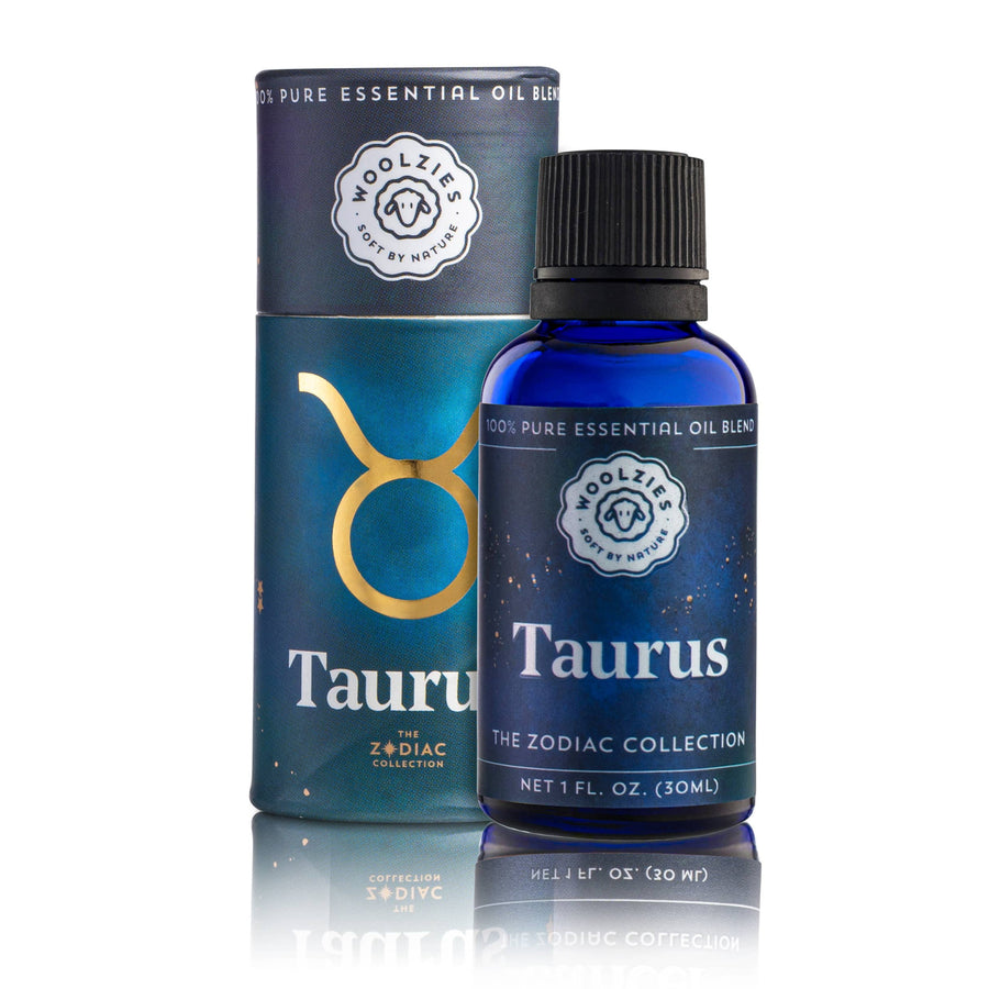 Taurus Zodiac Essential Oil Blend in 1oz dark blue glass bottle with gold and white zodiac label