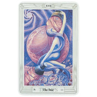 The star tarot card from thoth tarot deck small by aleister crowley features a serene figure in blue and white robes holding a lantern against a cosmic purple backdrop