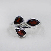 Sterling silver ring with three teardrop garnet stones in leaf design #BC0405