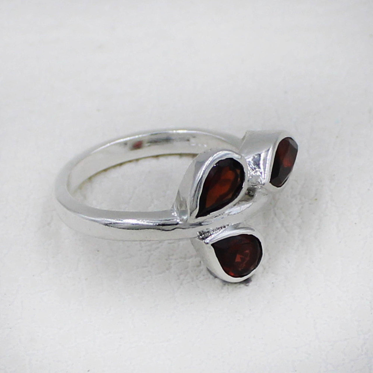 Sterling silver ring with three teardrop garnets in leaf design #BC0405