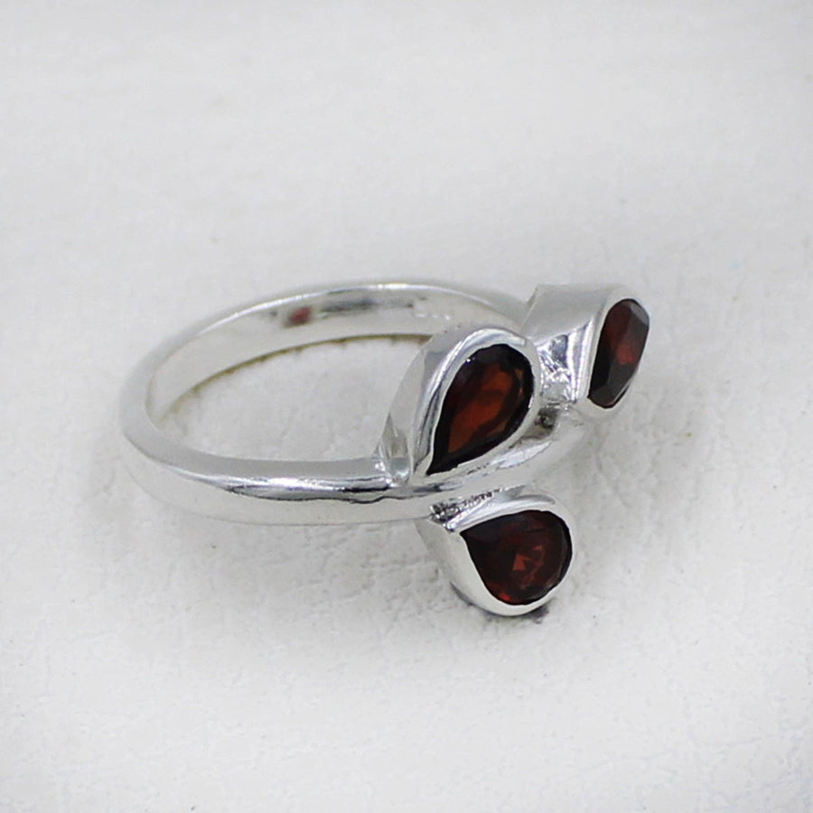 Sterling silver ring with three teardrop garnets in leaf design #BC0405