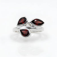 Sterling silver ring with three teardrop garnet stones in leaf design #BC0405