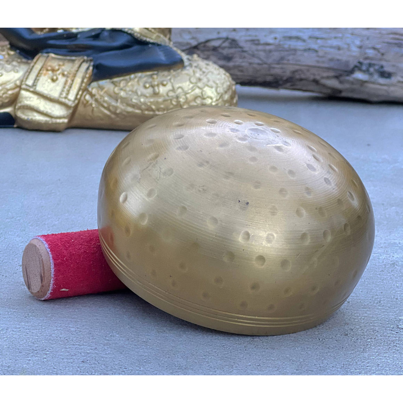 Golden singing bowl with mallet from Tibetan Brass Gong Meditation Singing Bowl Set LV7338
