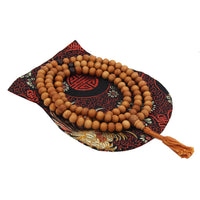 Wooden prayer beads with tassel from Tibetan Buddhist Sandal Wood Mala Necklace